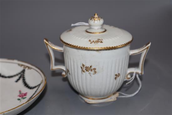 A Chelsea Derby tea bowl and saucer, a similar fluted cup an cover, c.1780, and a Worcester style cup and saucer, late 19th century,